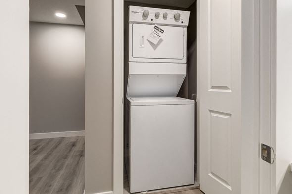 Spruce Grove apartment for rent - A white dishwasher is installed in a kitchen.