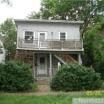Minneapolis apartment for rent - A two story house with a balcony on the second floor.