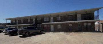 Copperas Cove apartment for rent - A car is parked in front of a building.