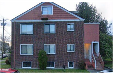 Everett apartment for rent - A red brick house with a white door and windows.