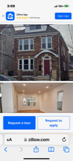 Jersey City apartment for rent - A house with a red door and a sign that says "Request a tour".