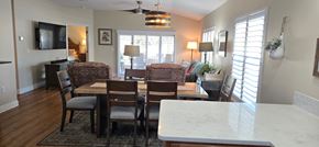 Sarasota house for rent - A dining room with a table and chairs.