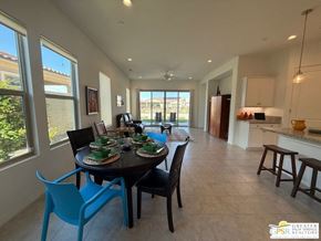 Rancho Mirage house for rent - A dining room with a table set for a meal.
