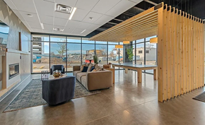 Denver house for rent - A modern living room with a view of the city.