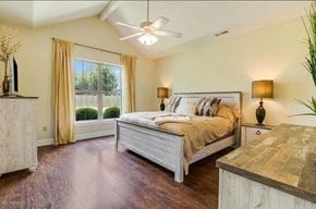 Lafayette house for rent - A bedroom with a bed, dresser, and window with curtains.