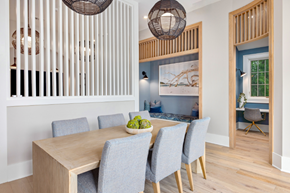 Charleston apartment for rent - A dining room with a wooden table and grey chairs.