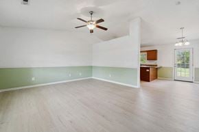 Richlands house for rent - A room with a ceiling fan and wooden flooring.