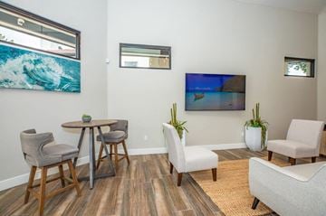 Chandler apartment for rent - A living room with a wooden table and chairs.