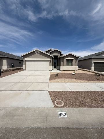 El Paso house for rent - A residential area with houses and a driveway in front of them.