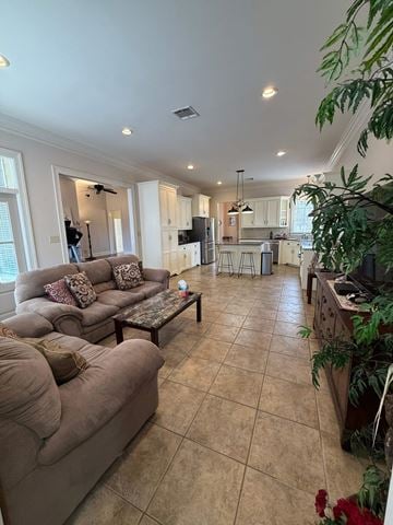 Lafayette house for rent - A living room with a grey couch and a coffee table.