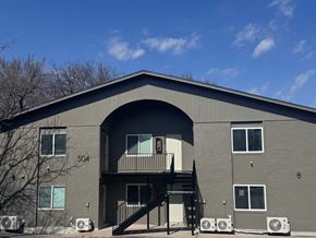 Austin apartment for rent - A grey building with the number 504 on it.