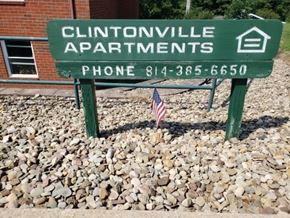 Clintonville apartment for rent - A sign for Clintonville Apartments with a phone number on it.