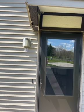 Delphos apartment for rent - A door with a window above it on a house.