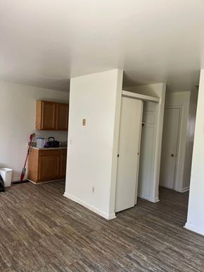Bluffton apartment for rent - A room with a white door and a brown cabinet.