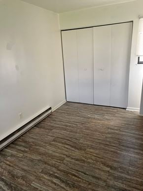 Bluffton apartment for rent - A room with a brown floor and white walls.