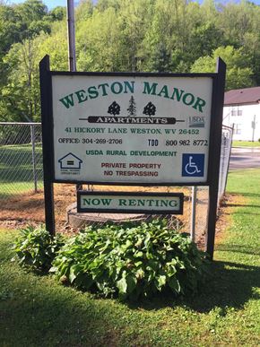 Weston apartment for rent - A sign for Weston Manor Apartments is now renting.