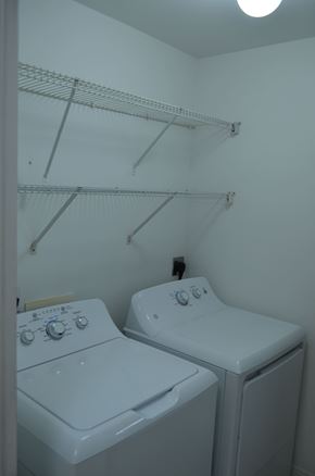 Cape Coral house for rent - A white sink and toilet in a small bathroom.