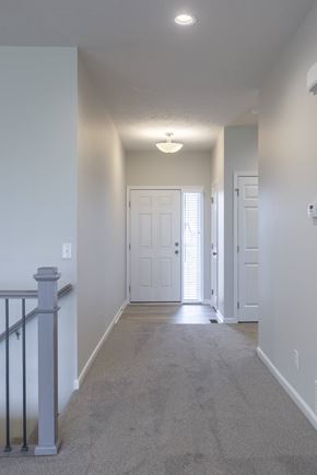 Gretna apartment for rent - A hallway with a carpeted floor and a light on the ceiling.
