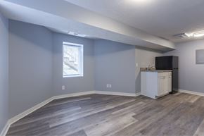 Omaha apartment for rent - A room with a window and a cabinet.