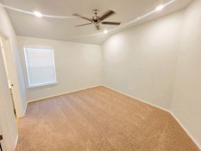 Copperas Cove house for rent - A room with a ceiling fan and carpeted floor.