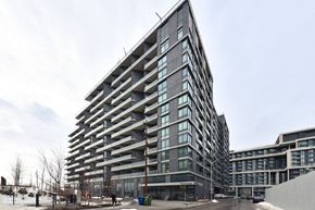 Toronto apartment for rent - A modern building with a lot of windows and balconies.