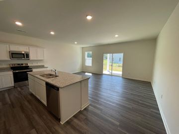 Wilson apartment for rent - A kitchen with a sink and a window.