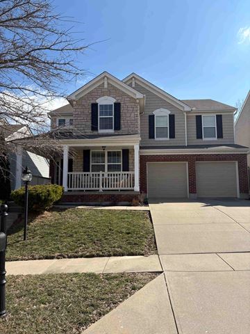 Union house for rent - A two-story house with a white porch and a brick base.