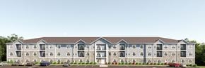 Mine Hill Township apartment for rent - A large building with a parking lot in front.