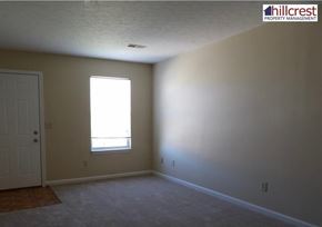 Florence house for rent - A room with a door and a window is empty and waiting to be furnished.