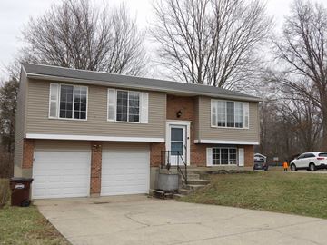Burlington house for rent - A two-story house with a garage and a driveway.