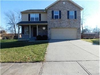 Burlington house for rent - A two-story house with a garage and a driveway.