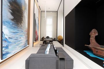 Toronto apartment for rent - A large painting hangs on the wall in a modern living room.
