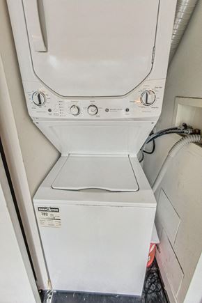 Toronto apartment for rent - A white washing machine with the label "Sunshine" on the front.