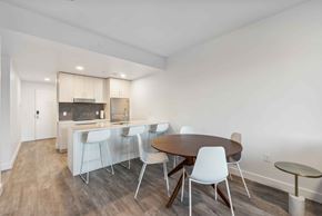 Park City apartment for rent - A dining room with a table and chairs.