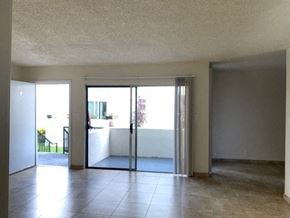 Sun Valley apartment for rent - A room with a sliding glass door leading to a balcony.