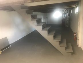 West Lawn house for rent - A staircase in a dimly lit room.