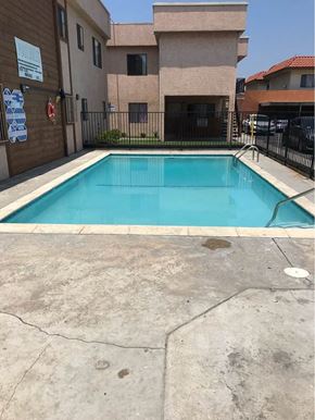 North Hills apartment for rent - A small pool in a concrete area surrounded by a fence.