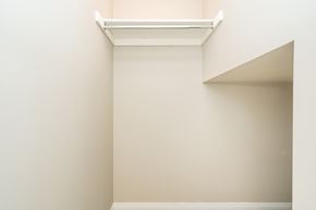 Mississauga apartment for rent - A white shelf is mounted on a wall.