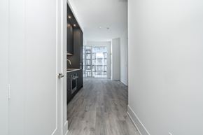 Toronto apartment for rent - A modern kitchen with a view of the city.