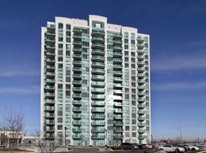 Mississauga apartment for rent - A tall residential building with many windows and balconies.