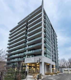 Georgetown apartment for rent - A tall, modern building with a black fence in front.
