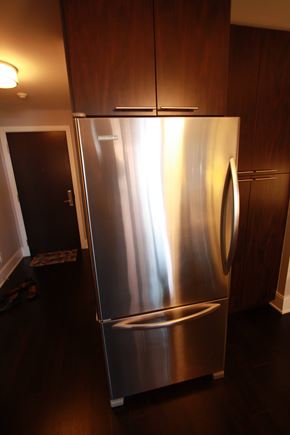 Toronto apartment for rent - A stainless steel refrigerator in a kitchen.