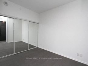 Toronto apartment for rent - A room with a sliding door and a grey floor.