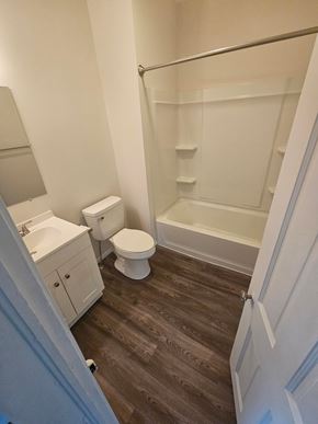 Lima house for rent - A white toilet and sink in a small bathroom.