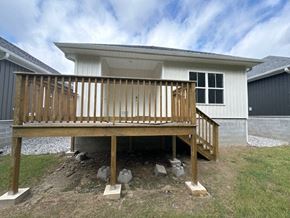Little Rock house for rent - A house under construction with a wooden deck.