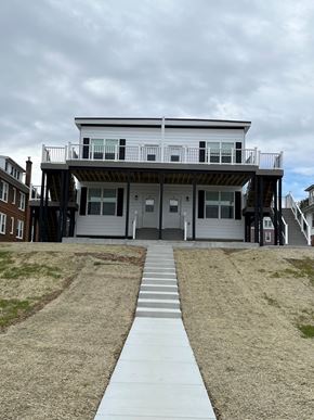 Shillington apartment for rent - A two-story house with a balcony on the second floor.
