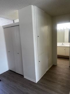 Anaheim apartment for rent - A white closet with a door and a mirror in the background.