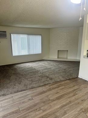Anaheim apartment for rent - A room with a window and a fireplace.