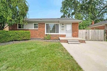Royal Oak house for rent - A house with a white door and a small porch.