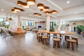 Columbus apartment for rent - A modern dining area with a round table and chairs.